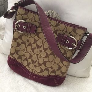 Beautiful plum *Coach*purse!  In great condition!